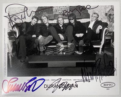 Lot 418 - DURAN DURAN - SIGNED PROMOTIONAL PHOTO.