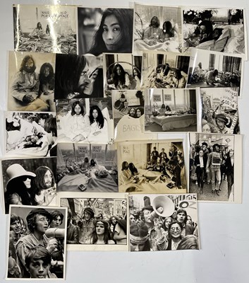 Lot 294 - THE BEATLES - JOHN LENNON / YOKO ONO-  BED IN PRESS PHOTOS.