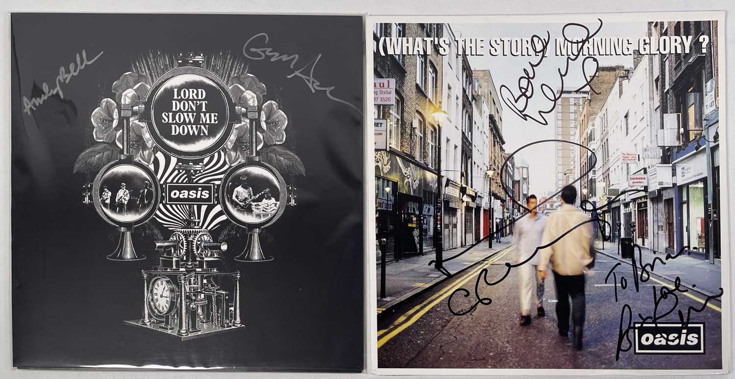 Lot 40 - OASIS - SIGNED COPY OF 'WHAT'S THE STORY...'