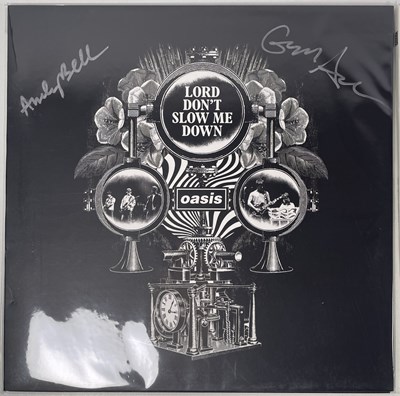 Lot 40 - OASIS - SIGNED COPY OF 'WHAT'S THE STORY...'