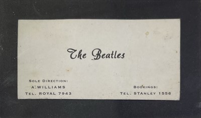 Lot 13 - THE BEATLES - FRAMED DISPLAY WITH ORIGINAL ALAN WILLIAMS BUSINESS CARD / MICHAEL WARD CAVERN PHOTO.