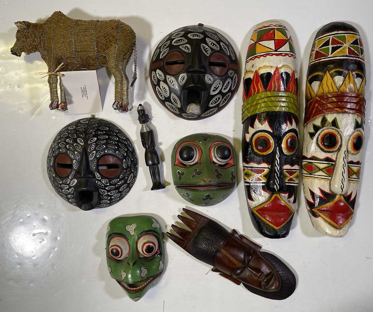 Lot 6 - MASKS AND STATUES - INDONESIAN.