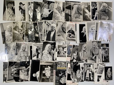 Lot 263 - DIANA DORS -  COLLECTION OF PRESS PHOTOGRAPHS.