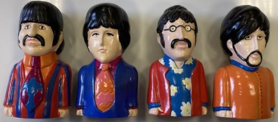 Lot 168 - THE BEATLES 1968 PRIDE CREATIONS YELLOW SUBMARINE MONEY BANKS.