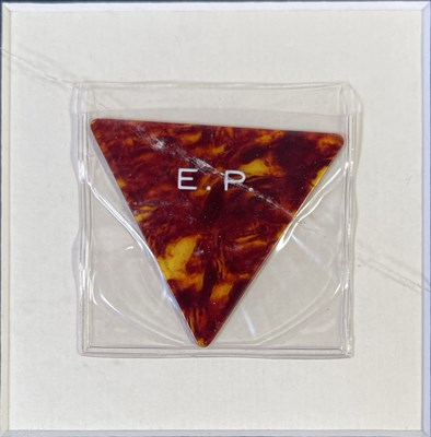 Lot 340 - ELVIS PRESLEY OWNED AND USED GUITAR PICK.