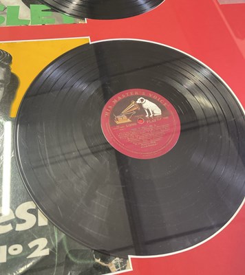 Lot 349 - ELVIS PRESLEY - ORIGINAL FRAMED DISPLAY WITH ALL ORIGINAL UK HMV RELEASES.