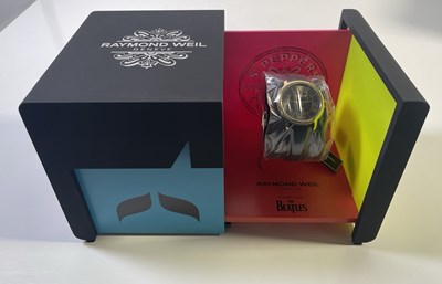 Lot 162 - THE BEATLES - RAYMOND WEIL SGT, PEPPER'S WATCH IN ORIGINAL BOX AND PACKAGING.