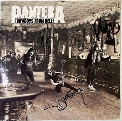 Lot 354 - PANTERA - A FULLY SIGNED COPY OF 'COWBOYS..'.