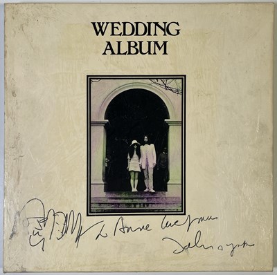 Lot 257 - JOHN LENNON AND YOKO ONO SIGNED WEDDING ALBUM COMPLETE WITH SKETCH