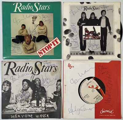 Lot 299 - RADIO STARS - FOUR SIGNED 7" SLEEVES.
