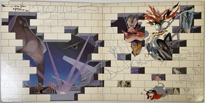 Lot 411 - PINK FLOYD - A FULLY SIGNED COPY OF 'THE WALL'.