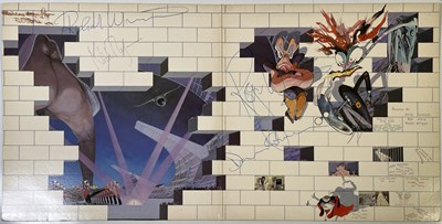 Lot 410 - PINK FLOYD - A FULLY SIGNED COPY OF 'THE WALL'.