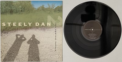 Lot 1046 - STEELY DAN - TWO AGAINST NATURE LP (EU ORIGINAL - GIANT RECORDS - 74321 62190 1)