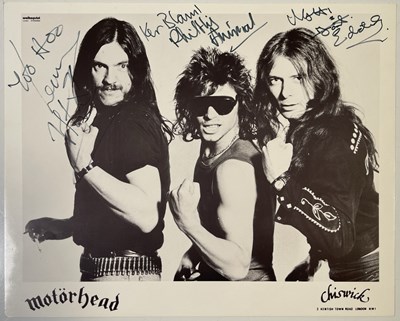 Lot 332 - MOTORHEAD - A SIGNED CHISWICK PROMOTIONAL PHOTO.