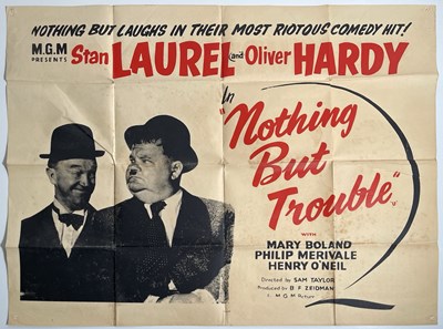 Lot 95 - LAUREL AND HARDY - NOTHING BUT TROUBLE (1944) - UK QUAD POSTER.