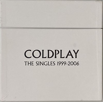 Lot 1314 - COLDPLAY - THE SINGLES 1999-2006 BOX SET (9463883247)