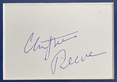 Lot 63 - SUPERMAN - CHRISTOPHER REEVE (1952-2004) SIGNED CARD IN MOUNT.