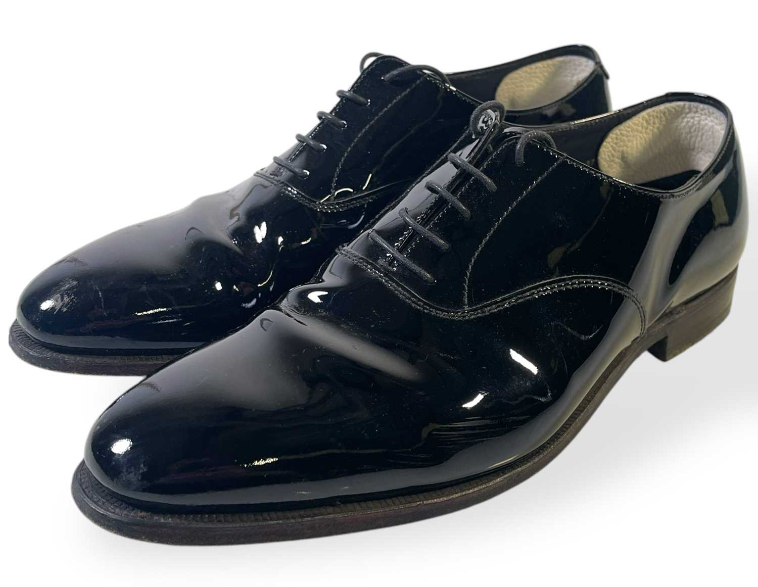 Lot 34 - PEAKY BLINDERS - FINN COLE AS MICHAEL GRAY - LIKELY SCREEN WORN PATENT LEATHER LOAFERS.