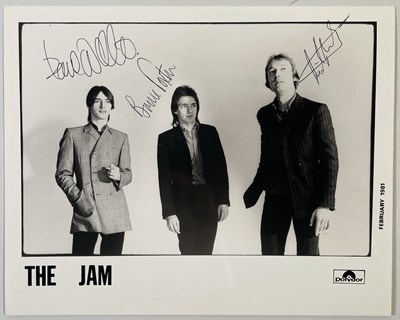 Lot 458 - THE JAM - A SIGNED POLYDOR PROMOTIONAL PHOTOGRAPH.