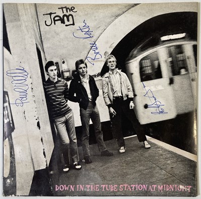 Lot 508 - THE JAM - SIGNED COPY OF 'ALL AROUND THE WORLD'.