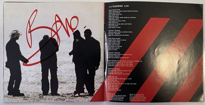 Lot 232 - U2 - SIGNED CD BOOKLET.