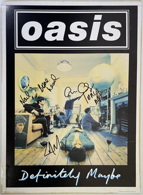 Lot 518 - OASIS - FULLY SIGNED DEFINITELY MAYBE POSTER.