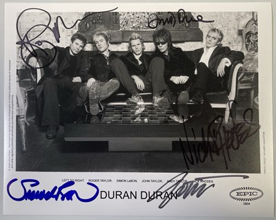 Lot 272 - DURAN DURAN - SIGNED 8X10" PHOTO.