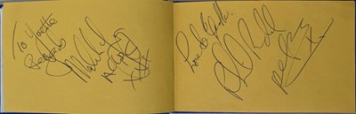 Lot 505 - AC/DC - FULL SET OF AUTOGRAPHS IN BOOK.