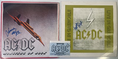 Lot 283 - AC/DC - TWO BRIAN JOHNSON SIGNED ALBUMS.