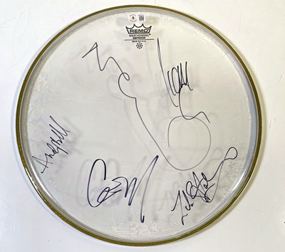 Lot 520 - OASIS - FULLY SIGNED DRUMSKIN.
