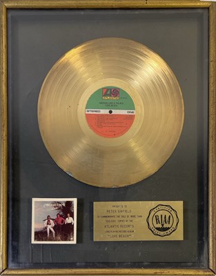 Lot 324 - THE PETE SINFIELD COLLECTION - EMERSON, LAKE AND PALMER - LOVE BEACH RIAA GOLD DISC AWARD.
