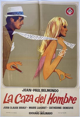 Lot 62 - JEAN PAUL BELMONDO - CAZA DEL HOMBRE / MALE HUNT (1964) - SPANISH ONE-SHEET POSTER.