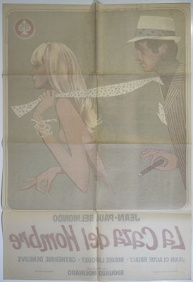 Lot 62 - JEAN PAUL BELMONDO - CAZA DEL HOMBRE / MALE HUNT (1964) - SPANISH ONE-SHEET POSTER.