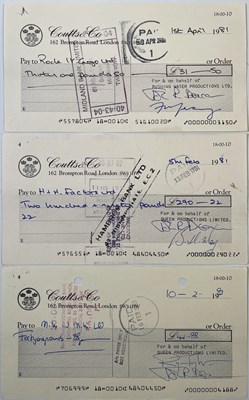 Lot 375 - QUEEN - A SET OF THREE C 1970S CHEQUES SIGNED BY THE BAND.