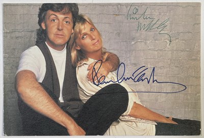 Lot 294 - THE BEATLES - PAUL AND LINDA MCCARTNEY SIGNED POSTCARD.
