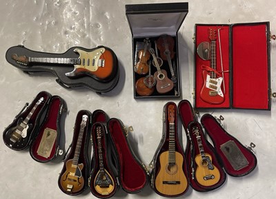 Lot 77 - BABY AXE / MINIATURE GUITAR COLLECTION.
