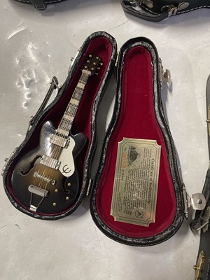 Lot 77 - BABY AXE / MINIATURE GUITAR COLLECTION.