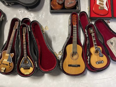 Lot 77 - BABY AXE / MINIATURE GUITAR COLLECTION.