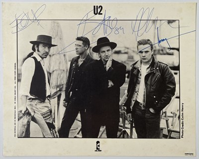 Lot 193 - U2 - FULLY SIGNED PROMOTIONAL PHOTO.