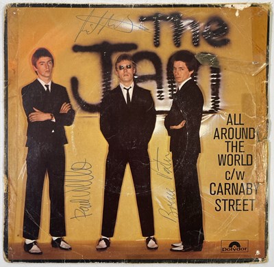 Lot 429 - THE JAM - SIGNED COPY OF 'ALL AROUND THE WORLD'.