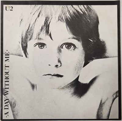 Lot 1041 - U2 - A DAY WITHOUT ME 7" (ORIGINAL DUTCH PICTURE SLEEVE COPY - ISLAND 102.657)