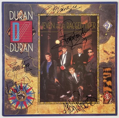 Lot 422 - DURAN DURAN - FULLY SIGNED COPY OF 'SEVEN AND THE RAGGED TIGER'.