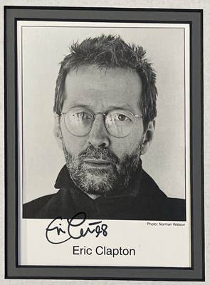 Lot 259 - ERIC CLAPTON - MEMORABILIA COLLECTION INC A SIGNED PHOTO.