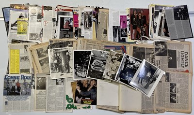 Lot 489 - THE CLASH - LARGE COLLECTION OF CUTTINGS AND VINTAGE PHOTOGRAPHER STAMPED 8X10"S.