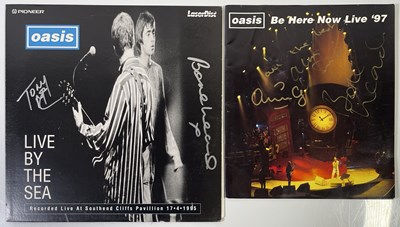Lot 436 - OASIS - BAND MEMBER SIGNED MEMORABILIA.
