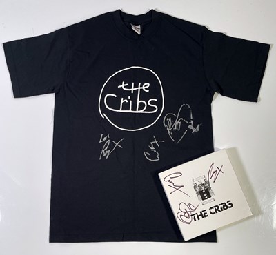 Lot 229 - THE CRIBS - SIX SINGLES / ONE CD AND A T-SHIRT - ALL SIGNED BY THE BAND.