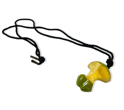 Lot 346 - THE BEATLES- RARE APPLE EMPLOYEE ISSUE APPLE CORE PENDANT.