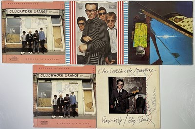 Lot 282 - ELVIS COSTELLO AND THE ATTRACTIONS - SINGLES SIGNED BY BRUCE AND PETE THOMAS.