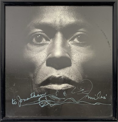 Lot 292 - MILES DAVIS - SIGNED AND DOODLED 'TUTU' SLEEVE.