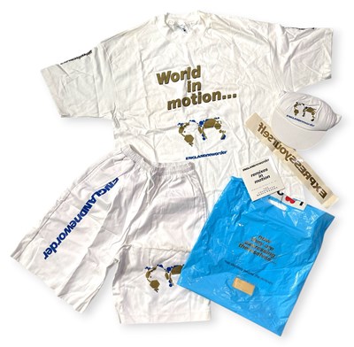 Lot 361 - NEW ORDER - WORLD IN MOTION PROMOTIONAL BUNDLE INC CLOTHING.